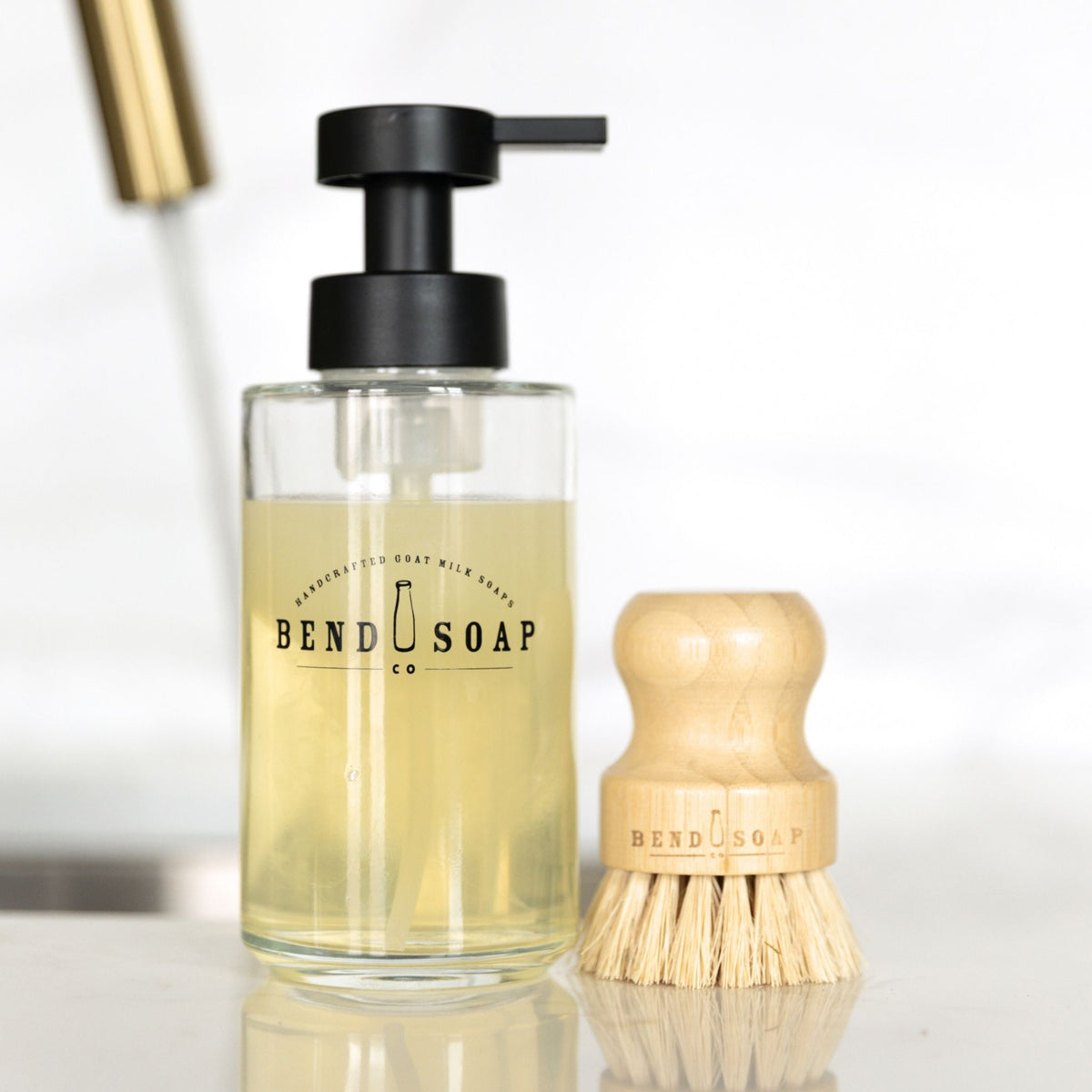 The Bend Soap Wooden Palm Brush look elevated and intentional on the countertop