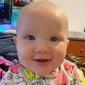 baby smiling with relief after using bend soap products